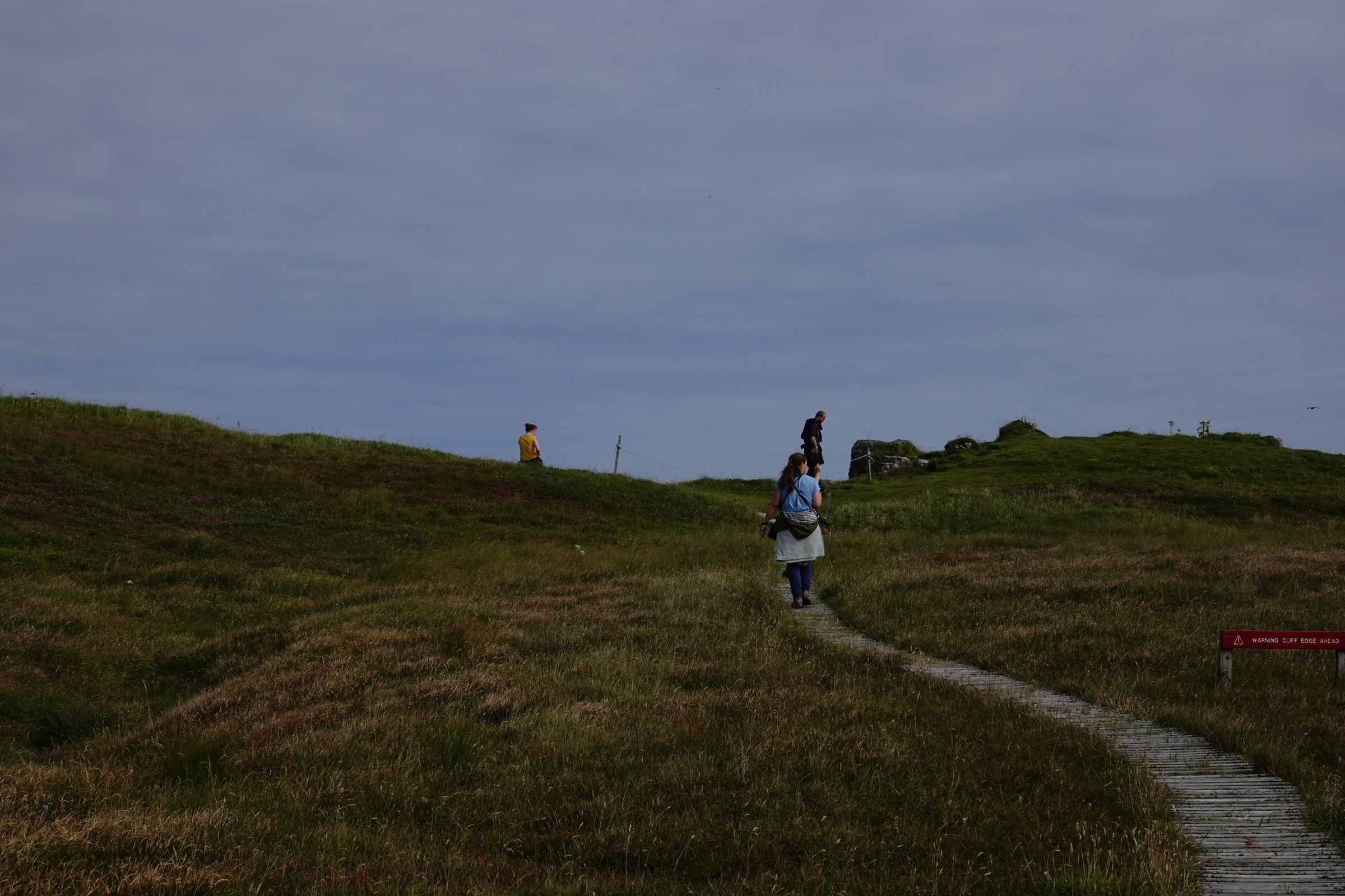 Visitors walking along the Handa Island reserve boardwalk