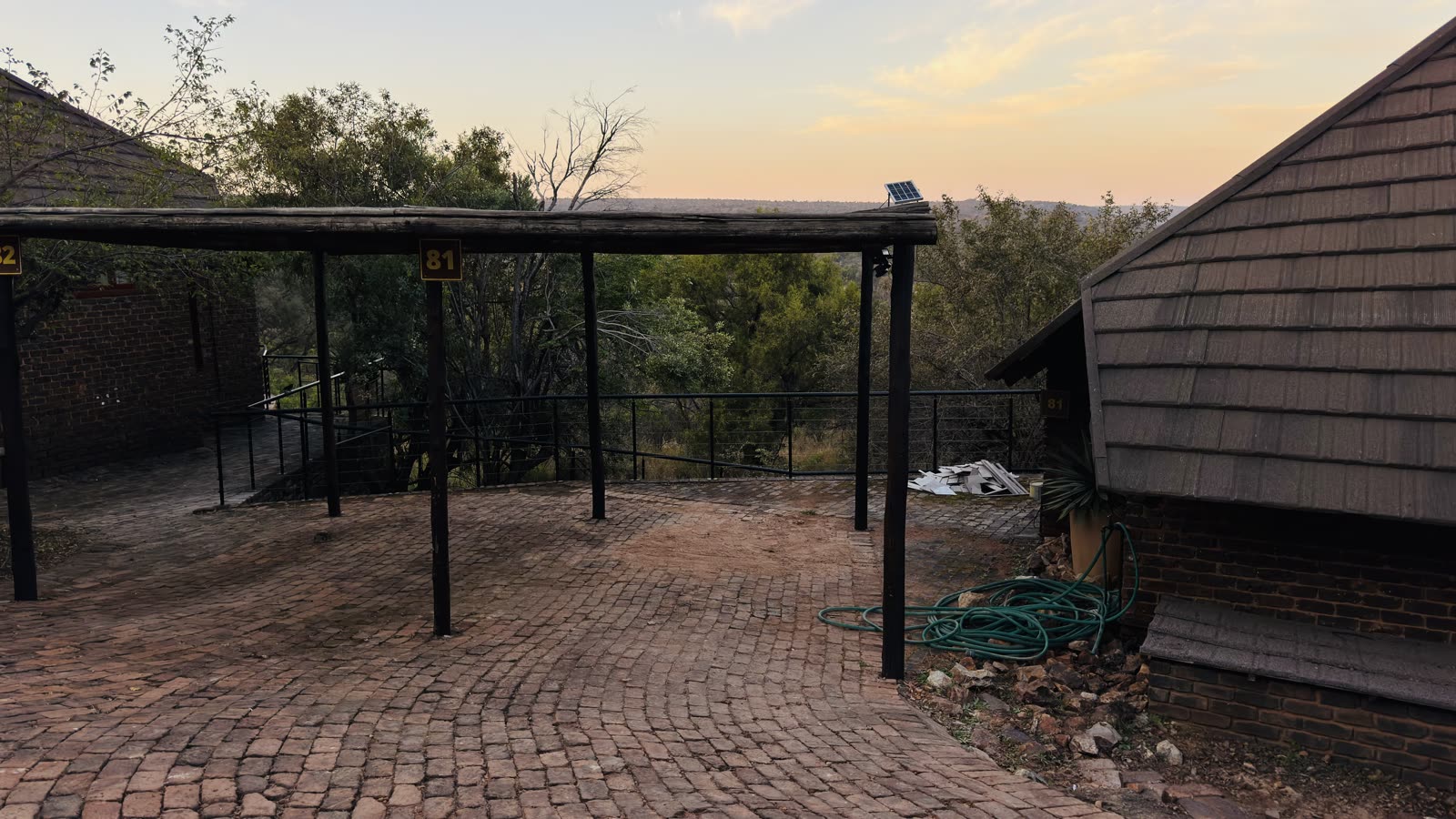 Mabalingwe Kubu Camp parking area and bushveld surroundings